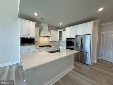 READY NOW-PHOTOS OF ACTUAL HOME!  This Laguna villa-style home on Plantation Lakes Golf and Country Club in Delaware - for sale on GolfHomes.com, golf home, golf lot