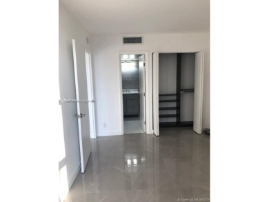 BEAUTIFUL MODERN 2 BEDROOM DIRECTLY ON COUNTRY CLUB CIRCLE on Turnberry Isle Resort and Club in Florida - for sale on GolfHomes.com, golf home, golf lot