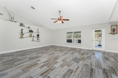 Impressive and spacious  4 Bedroom, 3 Bathroom home with on Kingsway Country Club in Florida - for sale on GolfHomes.com, golf home, golf lot