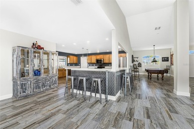 Impressive and spacious  4 Bedroom, 3 Bathroom home with on Kingsway Country Club in Florida - for sale on GolfHomes.com, golf home, golf lot