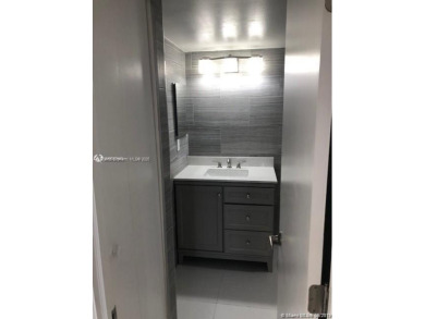 BEAUTIFUL MODERN 2 BEDROOM DIRECTLY ON COUNTRY CLUB CIRCLE on Turnberry Isle Resort and Club in Florida - for sale on GolfHomes.com, golf home, golf lot
