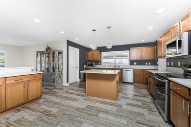 Impressive and spacious  4 Bedroom, 3 Bathroom home with on Kingsway Country Club in Florida - for sale on GolfHomes.com, golf home, golf lot