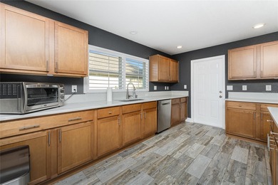 Impressive and spacious  4 Bedroom, 3 Bathroom home with on Kingsway Country Club in Florida - for sale on GolfHomes.com, golf home, golf lot