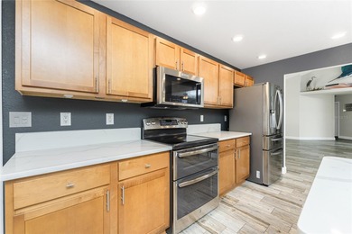 Impressive and spacious  4 Bedroom, 3 Bathroom home with on Kingsway Country Club in Florida - for sale on GolfHomes.com, golf home, golf lot