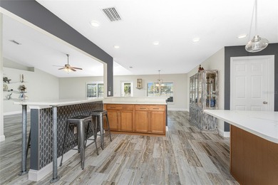 Impressive and spacious  4 Bedroom, 3 Bathroom home with on Kingsway Country Club in Florida - for sale on GolfHomes.com, golf home, golf lot