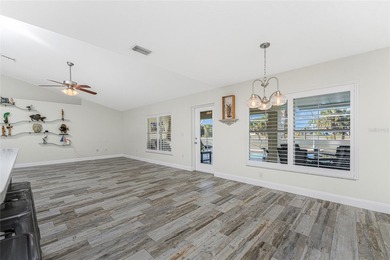 Impressive and spacious  4 Bedroom, 3 Bathroom home with on Kingsway Country Club in Florida - for sale on GolfHomes.com, golf home, golf lot