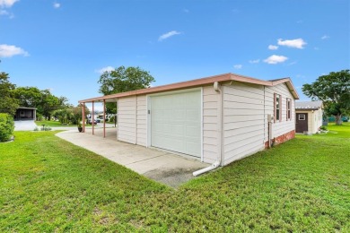NO BOND, NO CDD! Updated 2/2 home in the Village of Orange on El Diablo Executive Golf Course in Florida - for sale on GolfHomes.com, golf home, golf lot