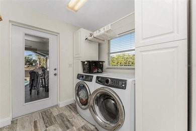 Impressive and spacious  4 Bedroom, 3 Bathroom home with on Kingsway Country Club in Florida - for sale on GolfHomes.com, golf home, golf lot