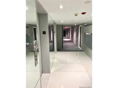 BEAUTIFUL MODERN 2 BEDROOM DIRECTLY ON COUNTRY CLUB CIRCLE on Turnberry Isle Resort and Club in Florida - for sale on GolfHomes.com, golf home, golf lot