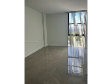BEAUTIFUL MODERN 2 BEDROOM DIRECTLY ON COUNTRY CLUB CIRCLE on Turnberry Isle Resort and Club in Florida - for sale on GolfHomes.com, golf home, golf lot