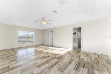 Impressive and spacious  4 Bedroom, 3 Bathroom home with on Kingsway Country Club in Florida - for sale on GolfHomes.com, golf home, golf lot