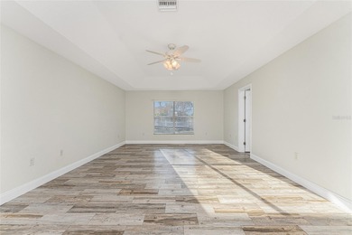 Impressive and spacious  4 Bedroom, 3 Bathroom home with on Kingsway Country Club in Florida - for sale on GolfHomes.com, golf home, golf lot