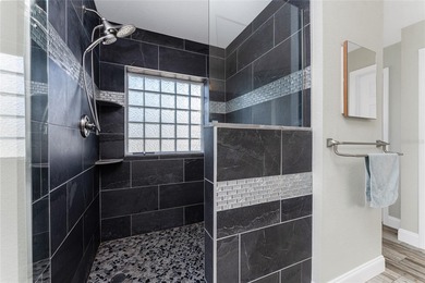 Impressive and spacious  4 Bedroom, 3 Bathroom home with on Kingsway Country Club in Florida - for sale on GolfHomes.com, golf home, golf lot