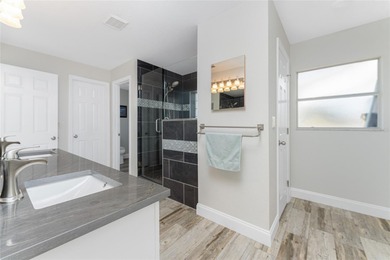 Impressive and spacious  4 Bedroom, 3 Bathroom home with on Kingsway Country Club in Florida - for sale on GolfHomes.com, golf home, golf lot