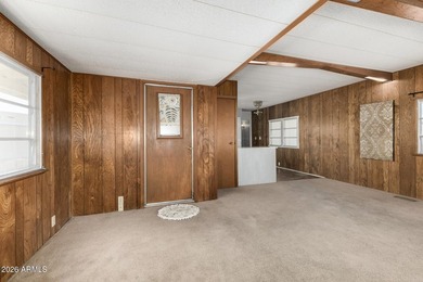 Charming home with great spaces and open layout! Large garage on Fountain of the Sun Country Club in Arizona - for sale on GolfHomes.com, golf home, golf lot