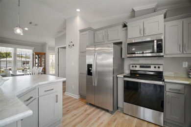 Come see this WATERFRONT 2 BED / 2 BATH / BONUS ROOM on Bay Tree Golf Course in Florida - for sale on GolfHomes.com, golf home, golf lot