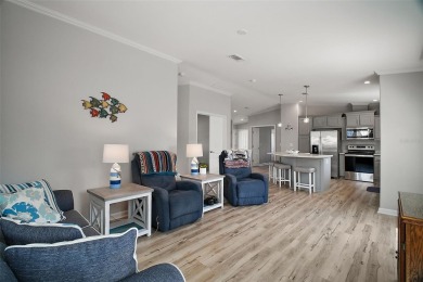 Come see this WATERFRONT 2 BED / 2 BATH / BONUS ROOM on Bay Tree Golf Course in Florida - for sale on GolfHomes.com, golf home, golf lot