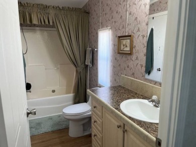 IF YOU ARE LOOKING FOR A 2 BEDROOMN 2 BATH IN MOVE-IN CONDITION on Southport Springs Golf Club in Florida - for sale on GolfHomes.com, golf home, golf lot
