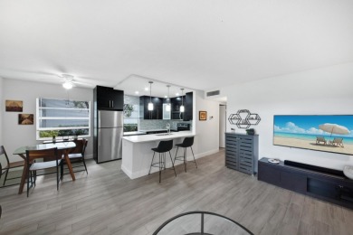 Step into this meticulously updated 2-bedroom, 2-bathroom condo on Kings Point Golf -Flanders Way in Florida - for sale on GolfHomes.com, golf home, golf lot