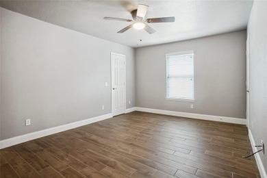 WOW! This home has it ALL! Beautiful 4 bedroom 3.5 bath 3 car on Eagle Mountain Country Club  in Texas - for sale on GolfHomes.com, golf home, golf lot