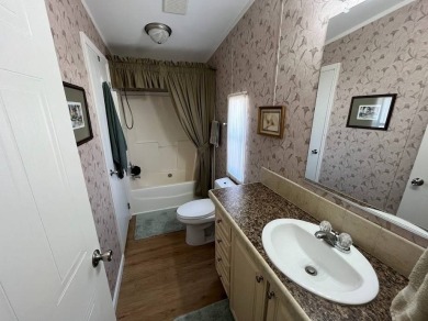 IF YOU ARE LOOKING FOR A 2 BEDROOMN 2 BATH IN MOVE-IN CONDITION on Southport Springs Golf Club in Florida - for sale on GolfHomes.com, golf home, golf lot