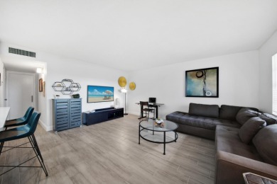 Step into this meticulously updated 2-bedroom, 2-bathroom condo on Kings Point Golf -Flanders Way in Florida - for sale on GolfHomes.com, golf home, golf lot