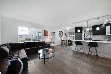 Step into this meticulously updated 2-bedroom, 2-bathroom condo on Kings Point Golf -Flanders Way in Florida - for sale on GolfHomes.com, golf home, golf lot