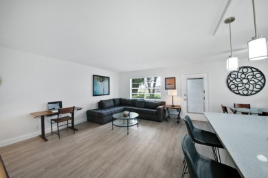 Step into this meticulously updated 2-bedroom, 2-bathroom condo on Kings Point Golf -Flanders Way in Florida - for sale on GolfHomes.com, golf home, golf lot