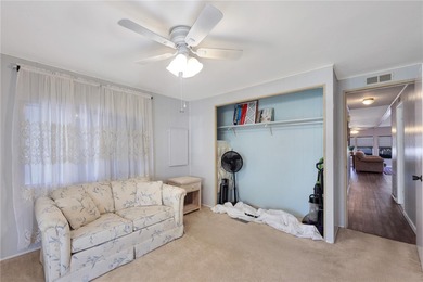 Enjoy relaxed Florida living in this 1978 home nestled inside a on Maple Leaf Golf and Country Club in Florida - for sale on GolfHomes.com, golf home, golf lot