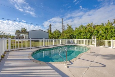 Discover your Florida dream home in the heart of Englewood! This on Oyster Creek Golf Club in Florida - for sale on GolfHomes.com, golf home, golf lot