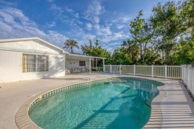 Discover your Florida dream home in the heart of Englewood! This on Oyster Creek Golf Club in Florida - for sale on GolfHomes.com, golf home, golf lot
