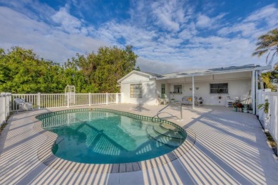 Discover your Florida dream home in the heart of Englewood! This on Oyster Creek Golf Club in Florida - for sale on GolfHomes.com, golf home, golf lot