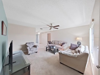Welcome to your sunny Florida retreat! This charming, move-in on Mainlands Golf Club in Florida - for sale on GolfHomes.com, golf home, golf lot