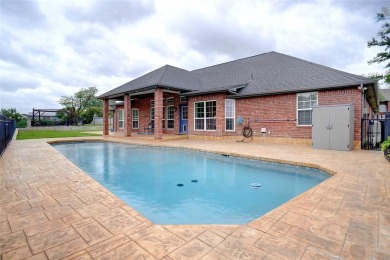 WOW! This home has it ALL! Beautiful 4 bedroom 3.5 bath 3 car on Eagle Mountain Country Club  in Texas - for sale on GolfHomes.com, golf home, golf lot