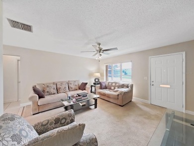 Welcome to your sunny Florida retreat! This charming, move-in on Mainlands Golf Club in Florida - for sale on GolfHomes.com, golf home, golf lot