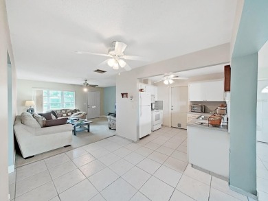 Welcome to your sunny Florida retreat! This charming, move-in on Mainlands Golf Club in Florida - for sale on GolfHomes.com, golf home, golf lot