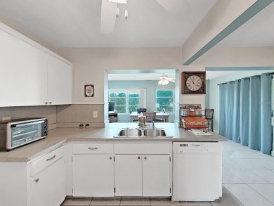 Welcome to your sunny Florida retreat! This charming, move-in on Mainlands Golf Club in Florida - for sale on GolfHomes.com, golf home, golf lot