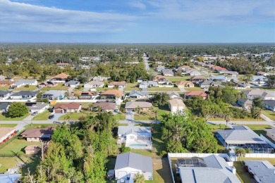Discover your Florida dream home in the heart of Englewood! This on Oyster Creek Golf Club in Florida - for sale on GolfHomes.com, golf home, golf lot