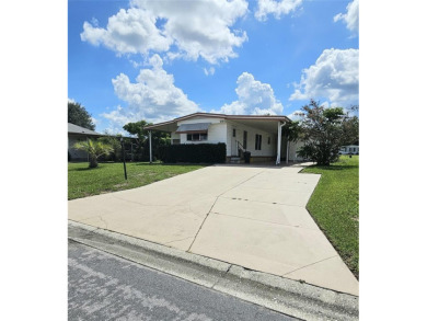 Looking for an inexpensive home giving you access to all The on Orange Blossom Hills Golf and Country Club in Florida - for sale on GolfHomes.com, golf home, golf lot