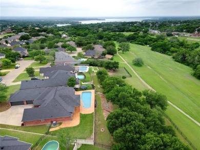 WOW! This home has it ALL! Beautiful 4 bedroom 3.5 bath 3 car on Eagle Mountain Country Club  in Texas - for sale on GolfHomes.com, golf home, golf lot