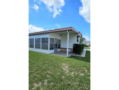Looking for an inexpensive home giving you access to all The on Orange Blossom Hills Golf and Country Club in Florida - for sale on GolfHomes.com, golf home, golf lot