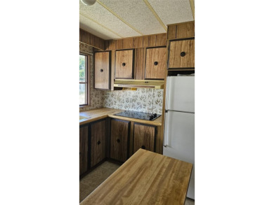 Looking for an inexpensive home giving you access to all The on Orange Blossom Hills Golf and Country Club in Florida - for sale on GolfHomes.com, golf home, golf lot