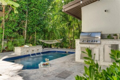Modern Gables Oasis - this move-in ready home offers serenity on Riviera Country Club in Florida - for sale on GolfHomes.com, golf home, golf lot