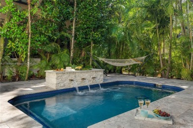 Modern Gables Oasis - this move-in ready home offers serenity on Riviera Country Club in Florida - for sale on GolfHomes.com, golf home, golf lot