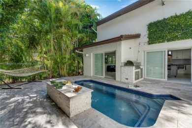 Modern Gables Oasis - this move-in ready home offers serenity on Riviera Country Club in Florida - for sale on GolfHomes.com, golf home, golf lot