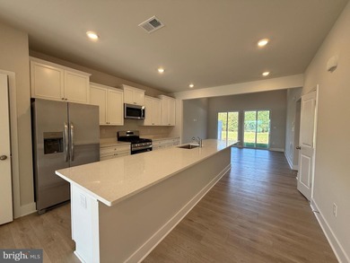 TWO PRIMARY BEDROOMS!  NOW COMPLETED, MOVE IN READY!  This on Plantation Lakes Golf and Country Club in Delaware - for sale on GolfHomes.com, golf home, golf lot