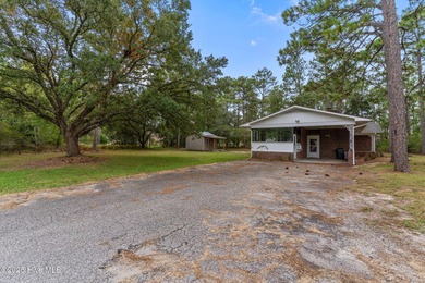 Take note of this nicely renovated 3 bedroom, 2 bath home in on The Lakes Country Club in North Carolina - for sale on GolfHomes.com, golf home, golf lot