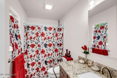 This 3 bed, 2 bath home built in 2023 is just a baby which means on Diamondhead Country Club in Mississippi - for sale on GolfHomes.com, golf home, golf lot