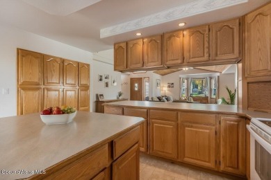 BRAND NEW FURNACE AND AC! Spacious single level home with 20' x on Hayden Lake Country Club in Idaho - for sale on GolfHomes.com, golf home, golf lot