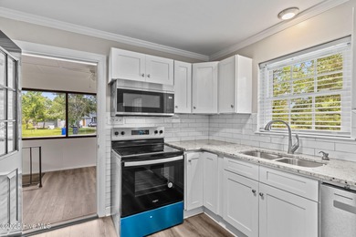 Take note of this nicely renovated 3 bedroom, 2 bath home in on The Lakes Country Club in North Carolina - for sale on GolfHomes.com, golf home, golf lot